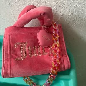 New juicy couture just not wt tags. . Never has been worn.